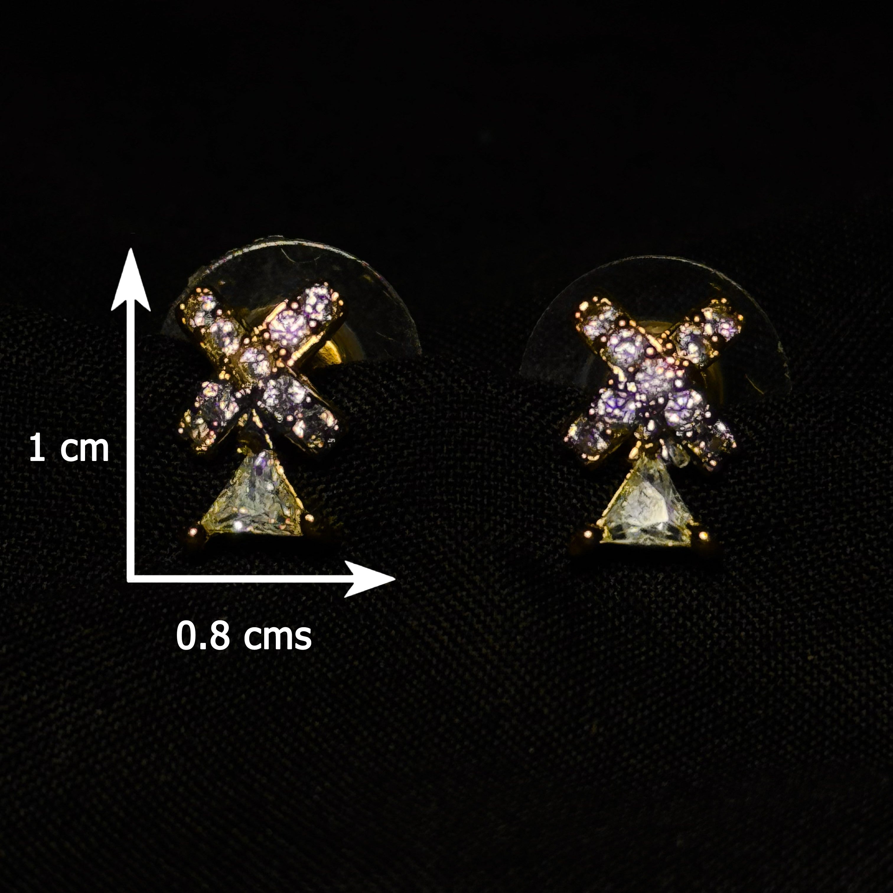 Pair of earrings with gemstones on a black background, showing size measurement.